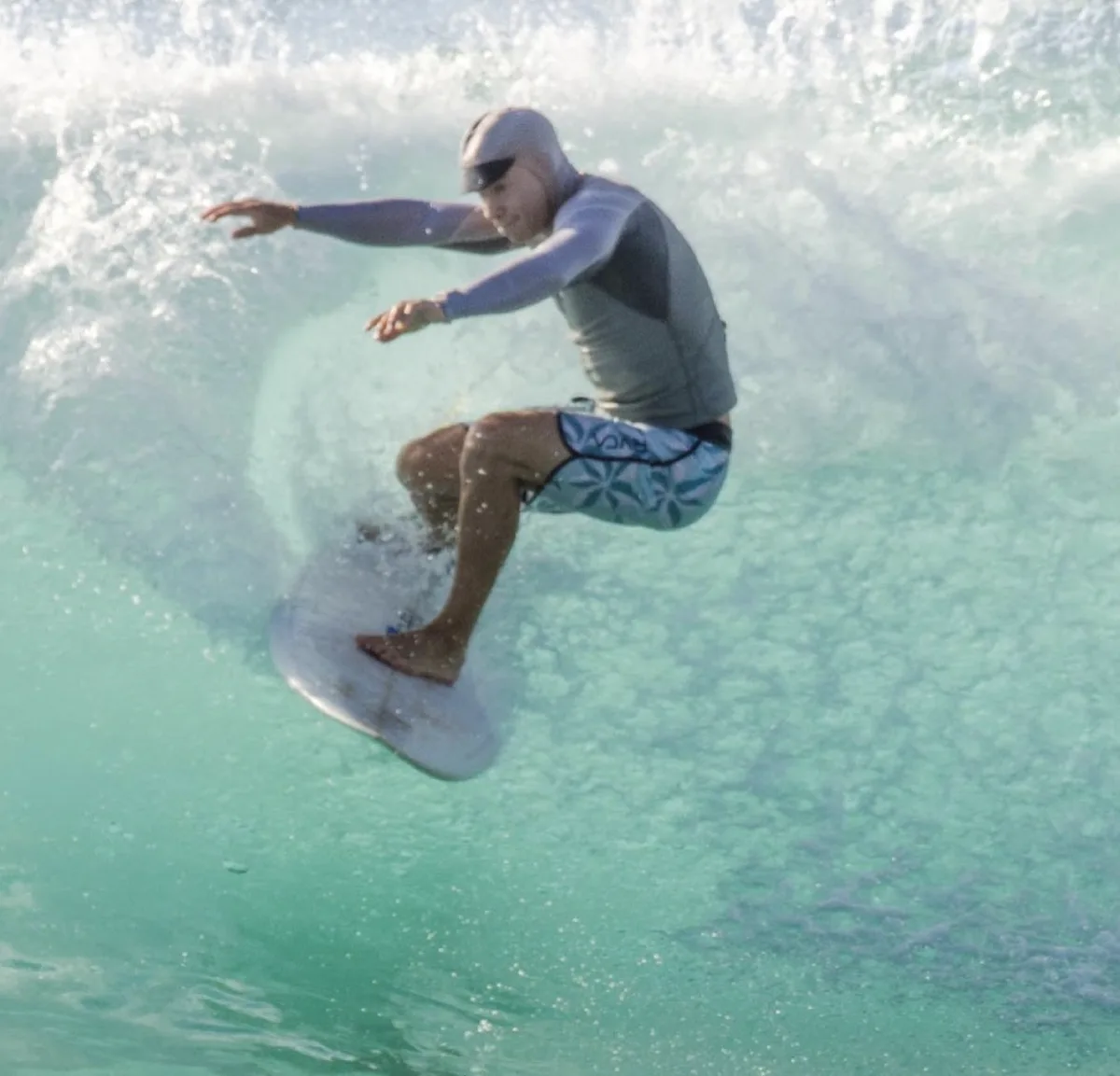 Jonah Larkin surfing a wave
